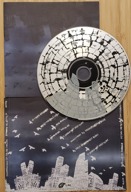 DISPENSING OF FALSE HALOS Growing Up, Giving In (cd) ZEGEMA BEACH RECORDS